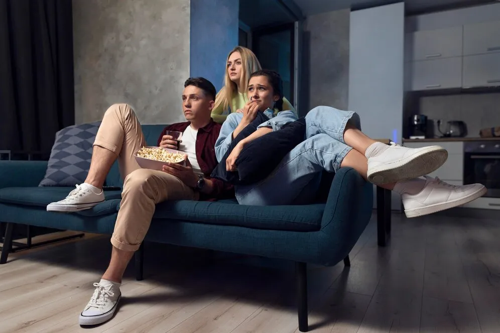 friends-watching-streaming-service-together-indoors_23-2149007915.jpg