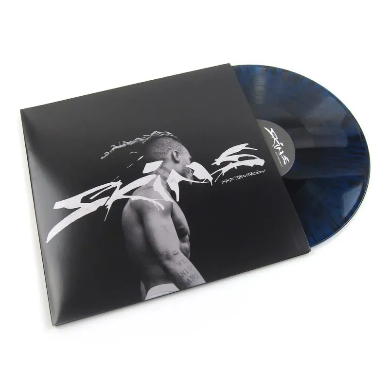 Skins (Translucent Blue with Black Splatter Vinyl)