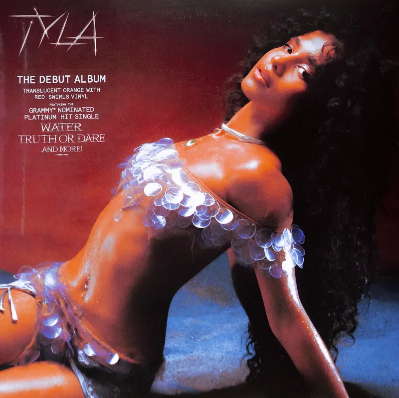 Tyla (Orange Translucent With Red Swirls Vinyl)